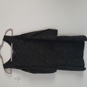 Cold shoulder style top, mid length sleeves with shoulder cutouts
